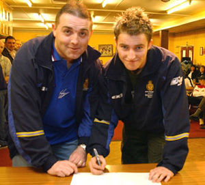 young Daniel Smith signing for Haven at the Fans Forum to promote the Warrington game.  He plays for the England Schools Team and is a product of the youth academy at Haven.