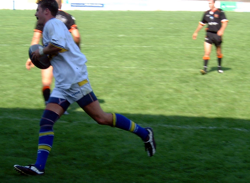 Paul Oneill strolls  behind the Oldham defenders for his second try